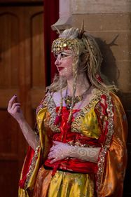 The spiral designs and antlers announce this Freeborn hakima is proud of her lineage.