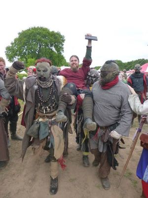 Steinr Senator for Skarsind Thanmir Hrafnar being carried from the Senate by Irontide Kask, Sunhammer Kirrik and Irontide Vio - among others.