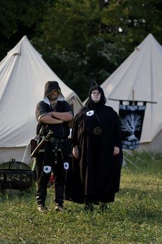 Highborn of all classes favour somber colours.