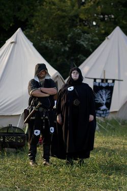 Highborn of all classes favour somber colours.