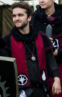 A stole marked with chapter symbol and flame of ambition.