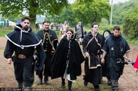 Even without obvious Chapter symbols, a lot can be achieved with matching colour schemes and pieces of costume - the similar hoods on these Suns of Couros help create a feeling of uniformity.