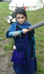 This changeling is young, but already displays the pride and confidence that are a mark of her heritage.