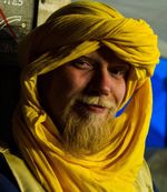 A Freeborn tagelmust - a dyed cotton garment with the appearance of both a veil and a turban.