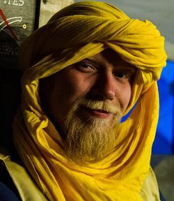 A Freeborn tagelmust - a dyed cotton garment with the appearance of both a veil and a turban.