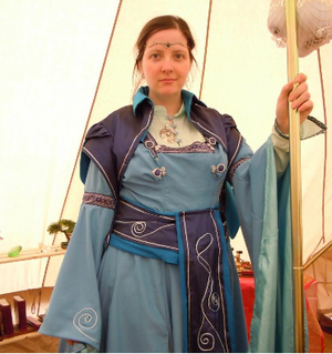 The Provost guides the magicians to formulate new rituals.