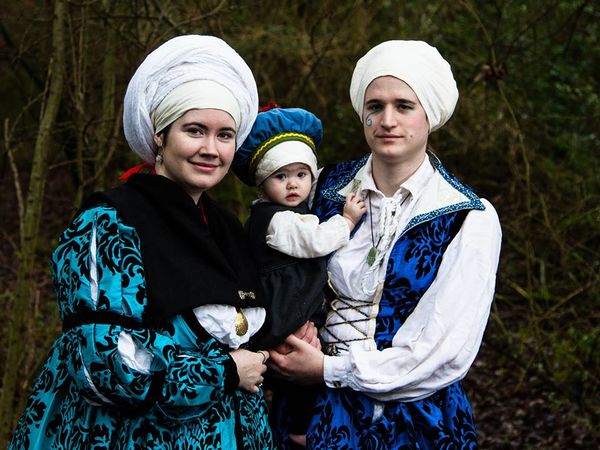 Representatives of the Church of the Little Mother in Sarvos, with an orphan