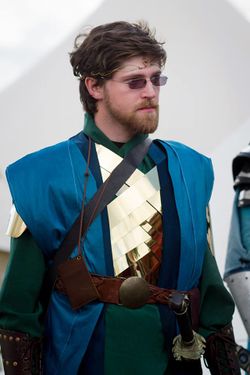 Banded armour with a strong fantasy visual.