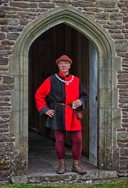 Stewards still wear the livery of their household.